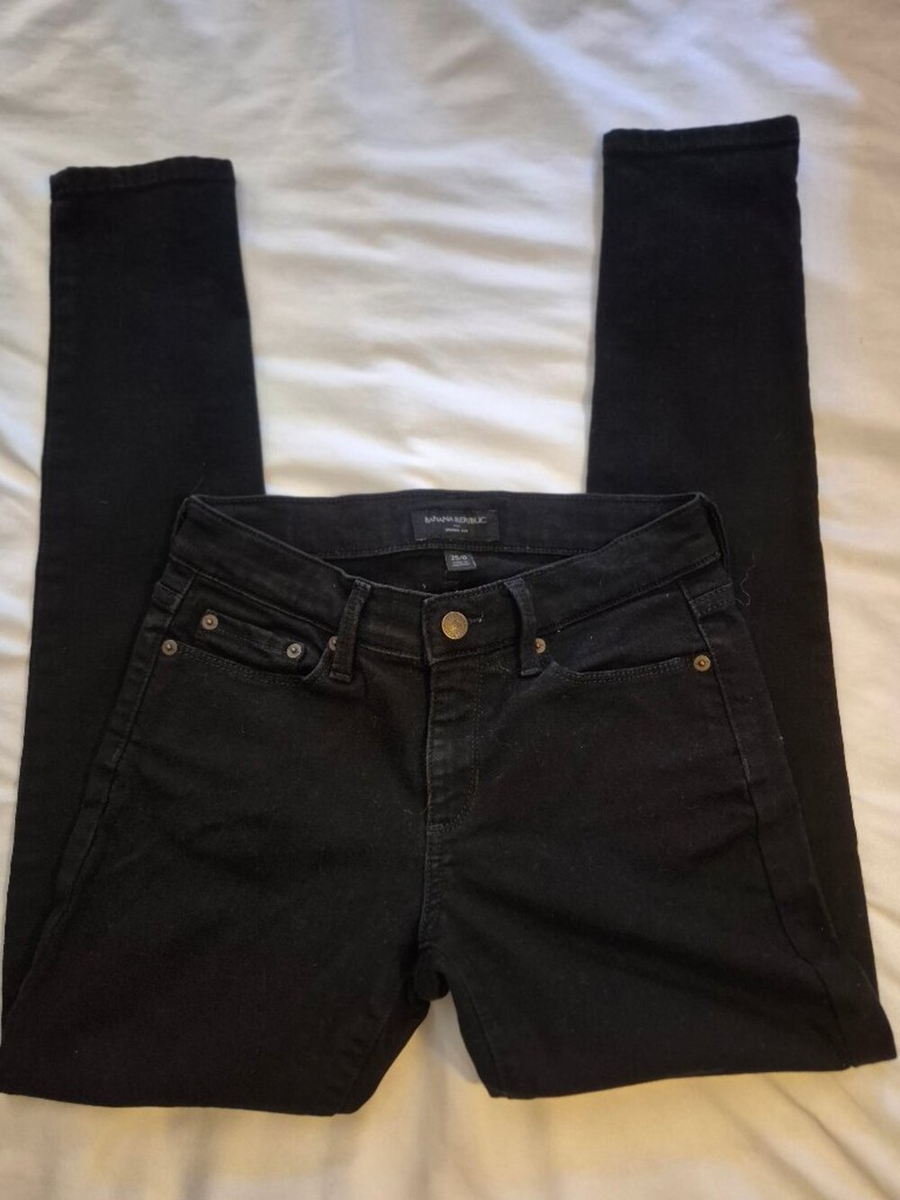 Skinny Jeans. Banana Republic. 25/0. Black..91% cotton.
